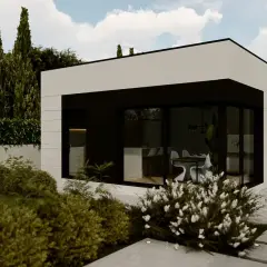 Casa moderna de construccion modular con amplios ventanales y jardín exuberante.