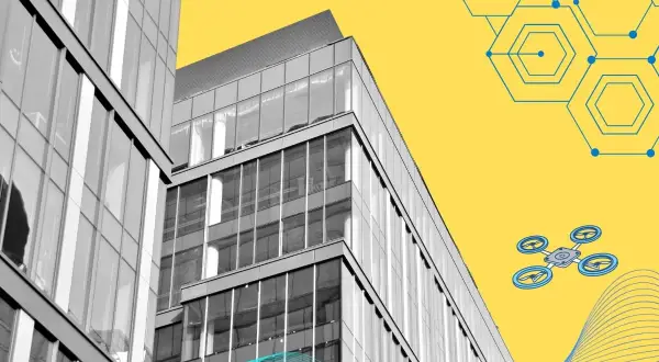 Edificio moderno con un dron y gráficos de red, simbolizando la **construcción 4.0**.