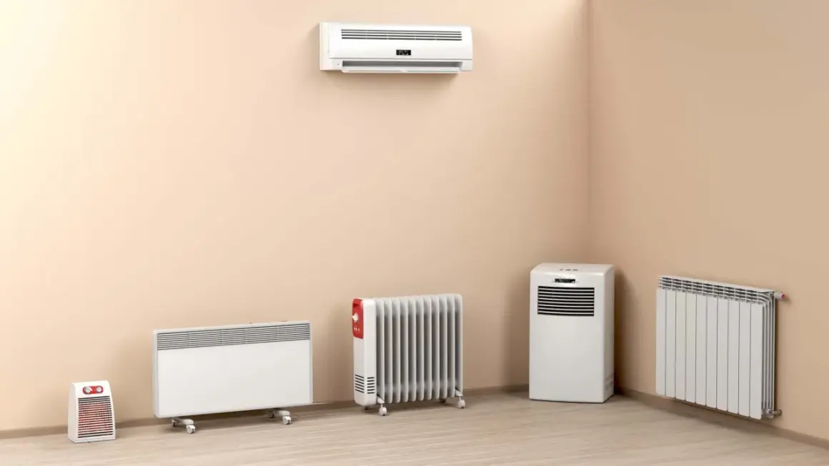 Soluciones para instalar calefacción sin obras: radiadores eléctricos, un split y un calefactor portátil en una habitación.
