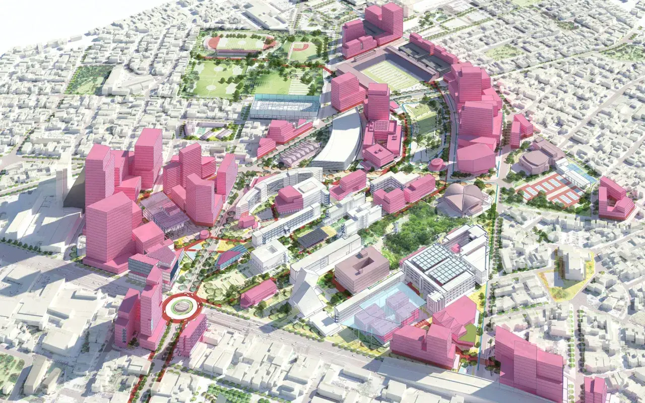 Dise&ntilde;o urbano moderno con edificios rosados y blancos, &aacute;reas verdes y un estadio. Un proyecto que busca la certificaci&oacute;n BREEAM.